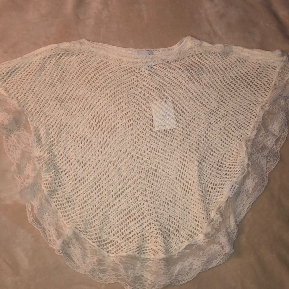 Unique white poncho